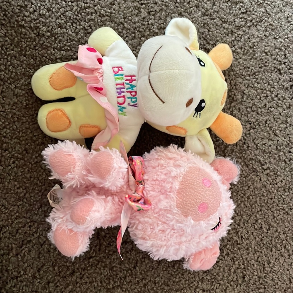 Two cute small travel plushies